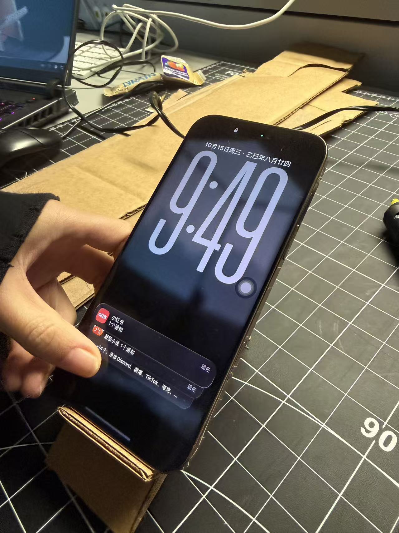 I built a simple cardboard prototype to check how well the phone could rest at a low viewing angle and whether the stand could keep it steady.